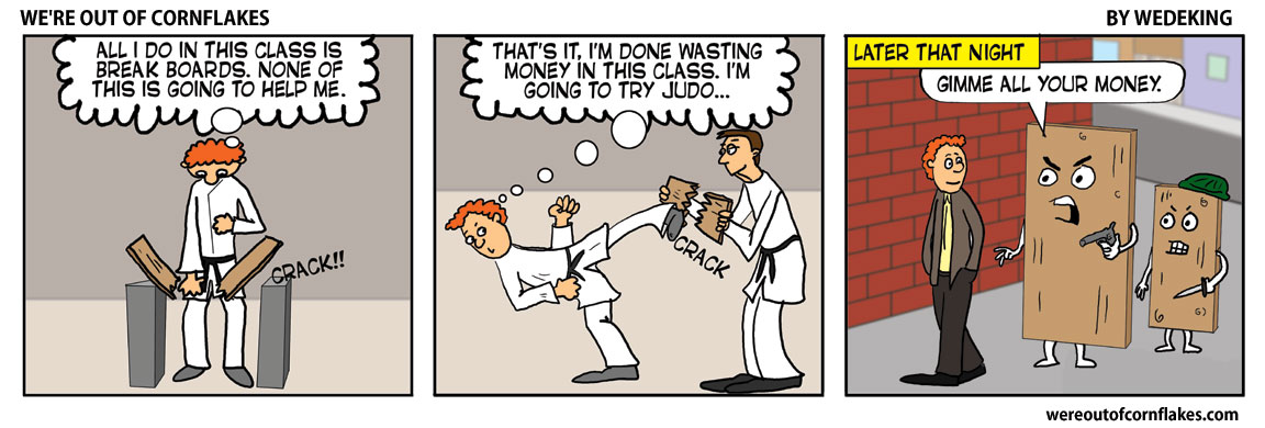 Breaking boards in karate class